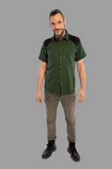Short sleeve shirt in 100% cotton fabric. With net and brass studs details on the shoulders.
